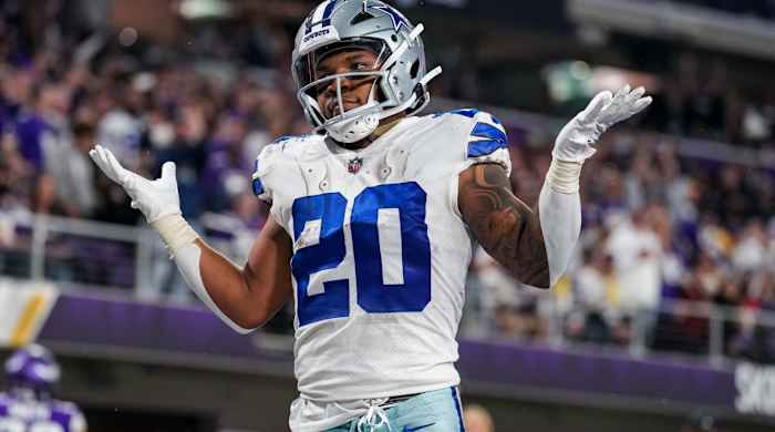 Nov 20, 2022; Minneapolis, Minnesota, USA; Dallas Cowboys running back Tony Pollard (20) celebrates his touchdown during the third quarter against the Minnesota Vikings at U.S. Bank Stadium. Mandatory Credit: Brace Hemmelgarn-USA TODAY Sports